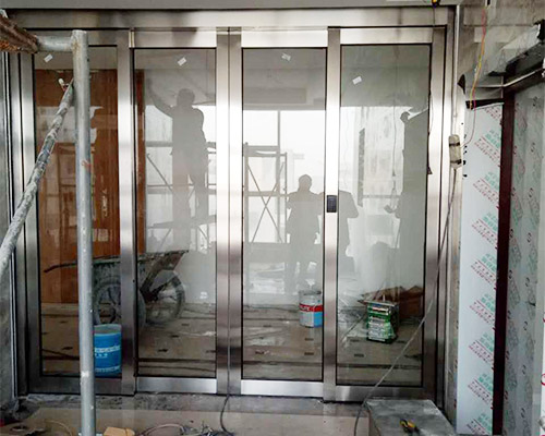 不銹鋼有框玻璃地簧門